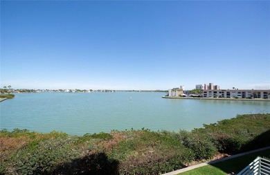 This luxury condo has breathtaking views of Boca Ciega Bay. It's - photo 3