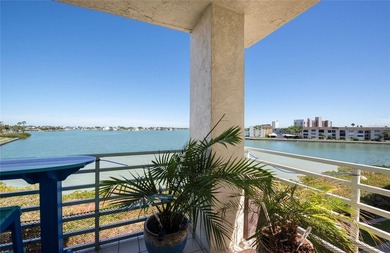 This luxury condo has breathtaking views of Boca Ciega Bay. It's - photo 4