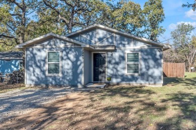 Lake Home For Sale in Pelican Bay, Texas