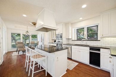 Nestled on a picturesque golf course lot in Richardson, this - photo 6