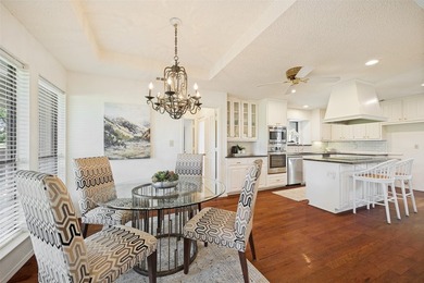 Nestled on a picturesque golf course lot in Richardson, this - photo 9