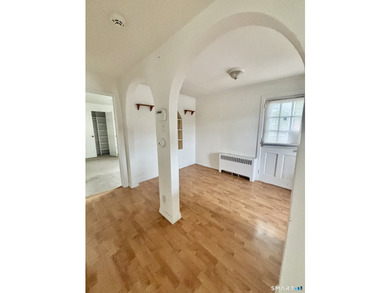 Opportunity knocks! This upper-level end-unit condo in Stamford - photo 11