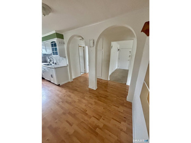 Opportunity knocks! This upper-level end-unit condo in Stamford - photo 14