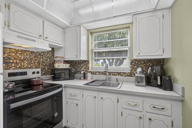 Rare first-floor corner end unit offering extra privacy - photo 16