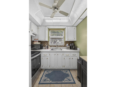 Rare first-floor corner end unit offering extra privacy - photo 17