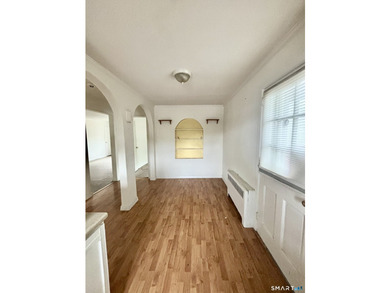 Opportunity knocks! This upper-level end-unit condo in Stamford - photo 18