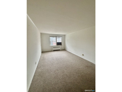 Opportunity knocks! This upper-level end-unit condo in Stamford - photo 20