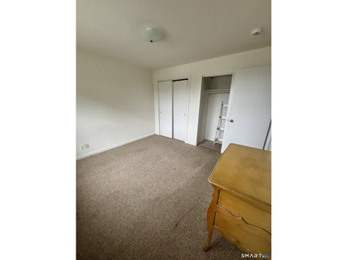 Opportunity knocks! This upper-level end-unit condo in Stamford - photo 22