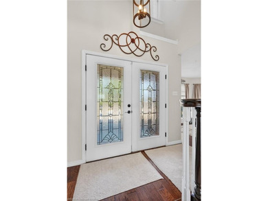 Perched on a premier .90-acre lot in the prestigious Point at - photo 4