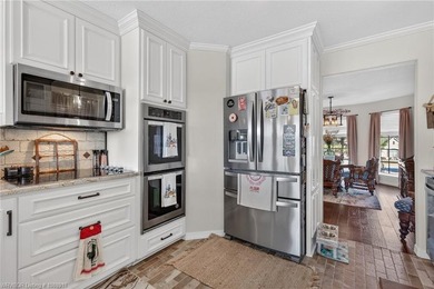 Perched on a premier .90-acre lot in the prestigious Point at - photo 7