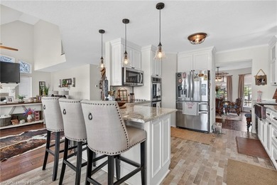 Perched on a premier .90-acre lot in the prestigious Point at - photo 10