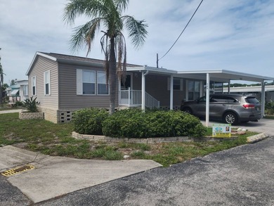 Welcome to this fabulous manufactured home in a very , well - photo 1