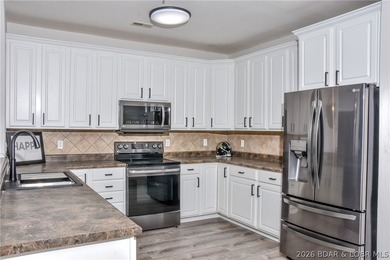 Experience lakefront living at its finest in this walk-out - photo 5