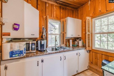 Enjoy the perfect lake escape with this charming waterfront - photo 11