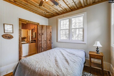 Enjoy the perfect lake escape with this charming waterfront - photo 14