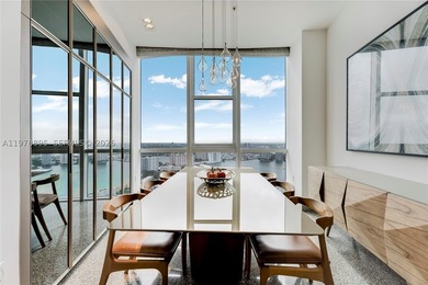 Perched on the 55th floor of the prestigious Trump Royale, this - photo 22