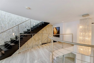 Perched on the 55th floor of the prestigious Trump Royale, this - photo 25