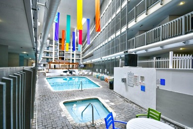 This TOTALLY REMODELED  Turnkey ocean view 2 bedroom unit is a