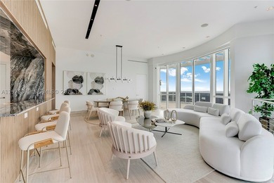 Perched on the 55th floor of the prestigious Trump Royale, this - photo 30