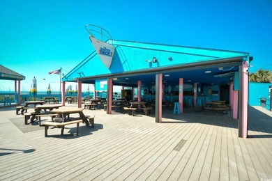 This TOTALLY REMODELED  Turnkey ocean view 2 bedroom unit is a