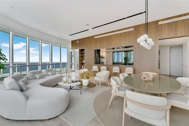 Perched on the 55th floor of the prestigious Trump Royale, this - photo 31