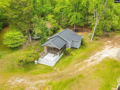 Enjoy the perfect lake escape with this charming waterfront - photo 32