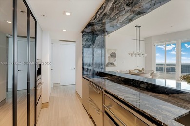 Perched on the 55th floor of the prestigious Trump Royale, this - photo 36