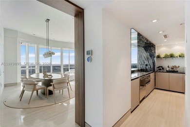 Perched on the 55th floor of the prestigious Trump Royale, this - photo 38