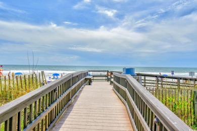 This TOTALLY REMODELED  Turnkey ocean view 2 bedroom unit is a