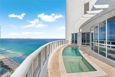 Perched on the 55th floor of the prestigious Trump Royale, this - photo 39