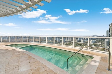 Perched on the 55th floor of the prestigious Trump Royale, this - photo 40