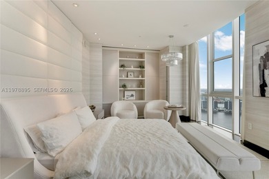 Perched on the 55th floor of the prestigious Trump Royale, this - photo 43