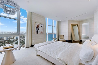 Perched on the 55th floor of the prestigious Trump Royale, this - photo 44