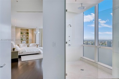 Perched on the 55th floor of the prestigious Trump Royale, this - photo 48