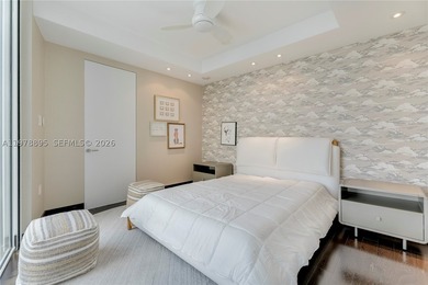 Perched on the 55th floor of the prestigious Trump Royale, this - photo 50