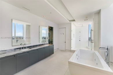 Perched on the 55th floor of the prestigious Trump Royale, this - photo 53