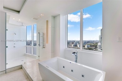 Perched on the 55th floor of the prestigious Trump Royale, this - photo 57