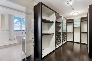 Perched on the 55th floor of the prestigious Trump Royale, this - photo 58