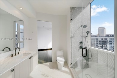 Perched on the 55th floor of the prestigious Trump Royale, this - photo 60