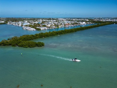 Nestled along the serene waterfront, these two picturesque - photo 12