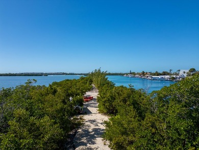 Nestled along the serene waterfront, these two picturesque - photo 18