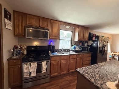 Welcome to this spacious 3 bedroom, 2 bath home in the desirable - photo 2