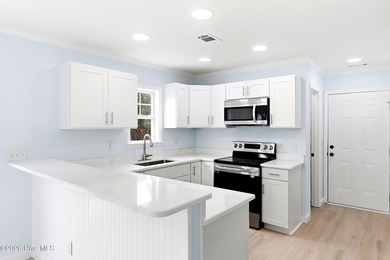 Beautifully updated and move-in ready, this 4-bedroom, 2.5-bath - photo 8