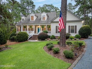 Located in Pinehurst #6, this beautiful Cape Cod-style home is - photo 1