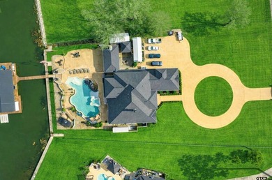Stunning 5,776 sq.ft. lake-front home on beautifully landscaped - photo 2