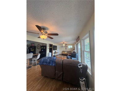 Welcome to your perfect lake getaway! This cute one-level - photo 3