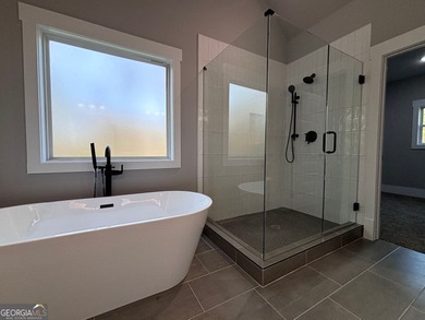 **Stunning New Construction with Owner's Suite on Main & Outdoor