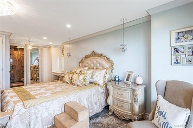 Wake up to stunning water views in this beautifully renovated - photo 17