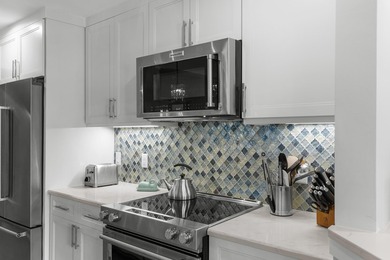 This beautifully updated coastal condo offers the perfect blend - photo 21