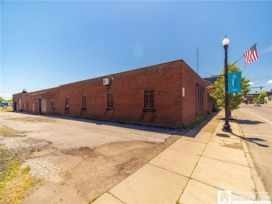 Large well maintained brick building with ample parking situated - photo 2